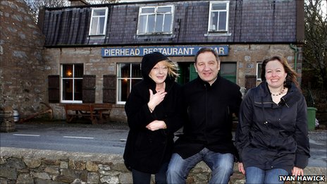 Between Weathers Director Jim Brown with Pierhead Owner Denise Anderson